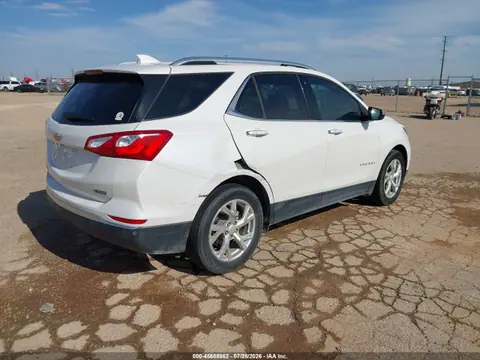 2018 Chevrolet Equinox Premier VIN 2GNAXMEV9J6211631 фото 4