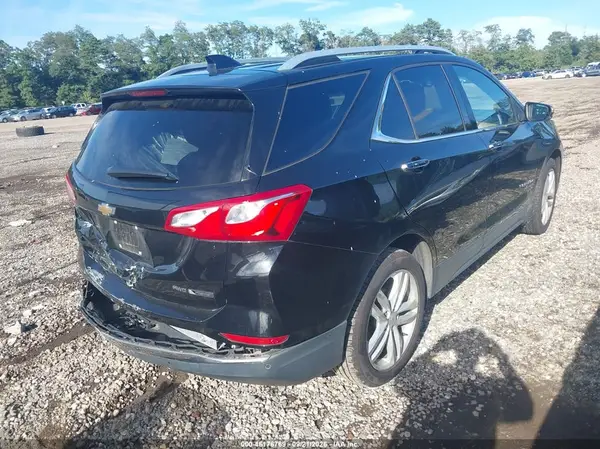 2GNAXVEV1J6345524 — 2018 Chevrolet Equinox, фото 4 с аукциона IAAI, Задняя часть