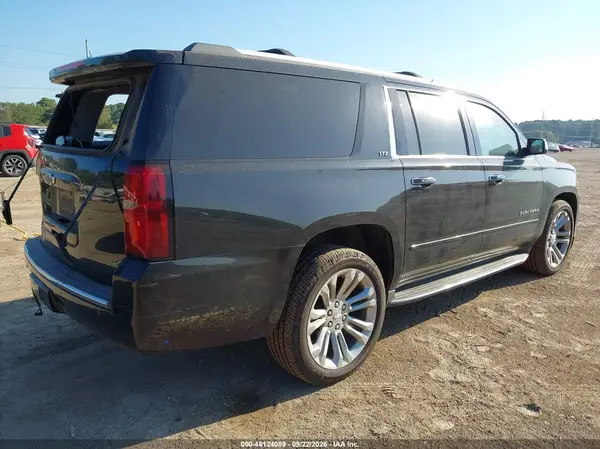 1GNSKJKC6GR387814 — 2016 Chevrolet Suburban, фото 4 с аукциона IAAI, Задняя часть слева