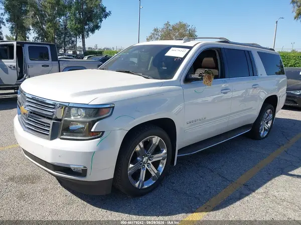 1GNSKJKC9GR304473 — 2016 Chevrolet Suburban, фото 2 с аукциона IAAI, LEFT & RIGHT SIDE