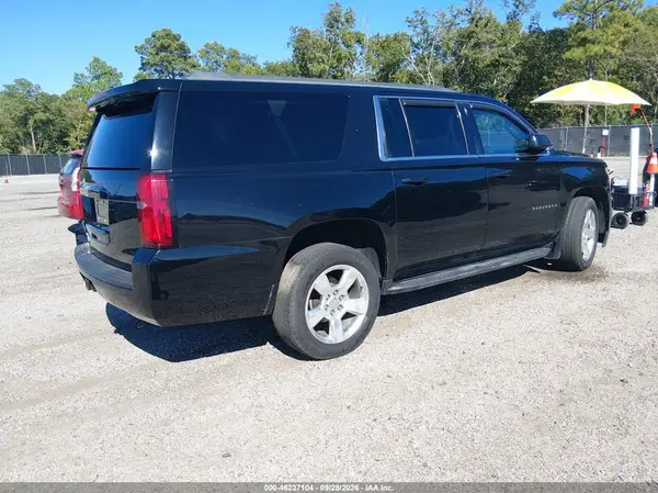 1GNSKHKC9GR117453 — 2016 Chevrolet Suburban, фото 4 с аукциона IAAI 08.10.2026, Задняя часть слева