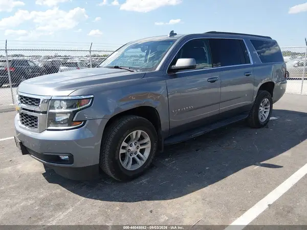 1GNSKHKC8KR304627 — 2019 Chevrolet Suburban, Передняя часть слева (Left Front), фото до ремонта