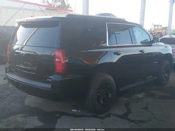 1GNSKBKC4KR258047 — 2019 Chevrolet Tahoe, фото 4 с аукциона IAAI, Левый бок