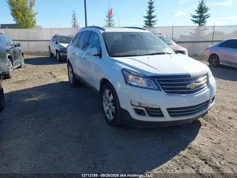1GNKVJKD8GJ315298 — 2016 Chevrolet Traverse LTZ, Град (Hail), фото до ремонта