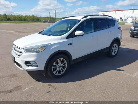 2017 Ford ESCAPE SE VIN 1FMCU9G90HUD31543 фото 2