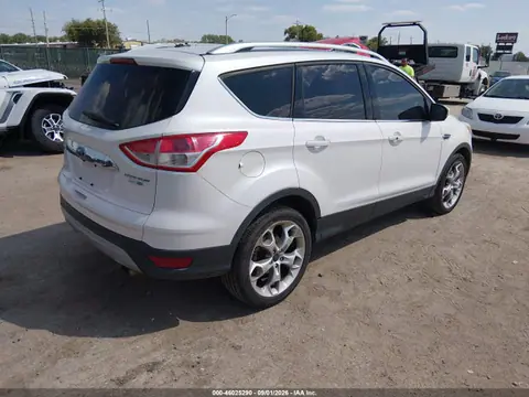2014 Ford Escape Titanium VIN 1FMCU9J96EUE12115 фото 4