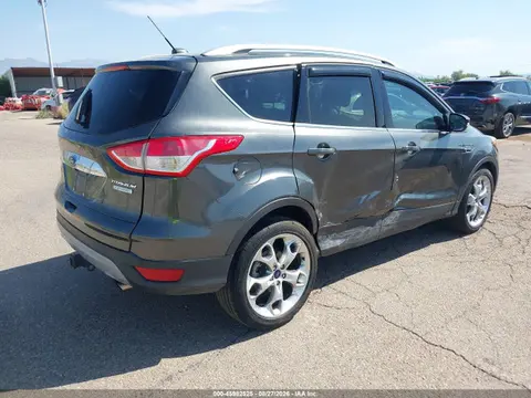 2016 Ford Escape Titanium VIN 1FMCU0J90GUB73160 фото 4