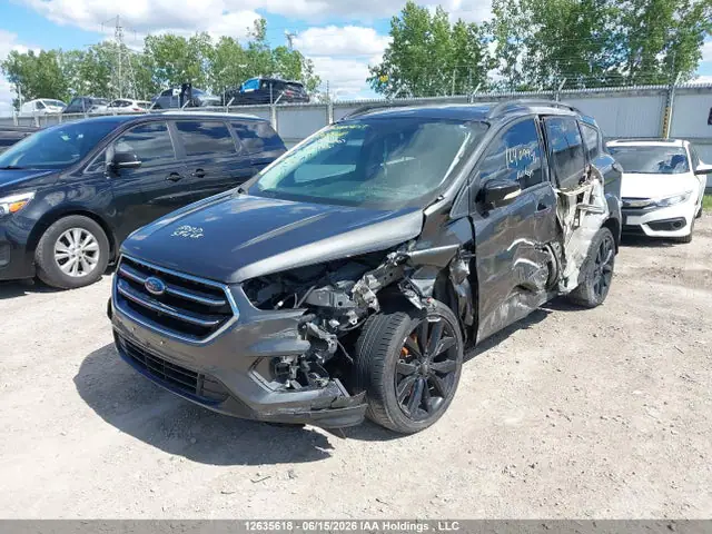 1FMCU9J99HUD87909 — 2017 Ford Escape Titanium, фото 2 с аукциона IAAI 14.10.2026, Левый бок