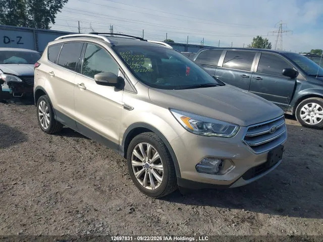 2017 Ford Escape Titanium VIN 1FMCU9J96HUE60864 фото 1