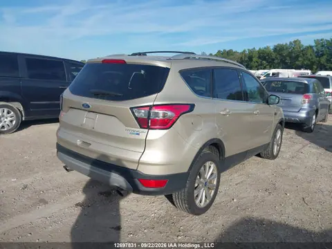 2017 Ford Escape Titanium VIN 1FMCU9J96HUE60864 фото 4