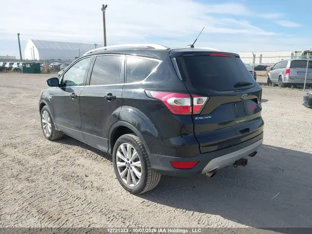 2017 Ford Escape Titanium VIN 1FMCU9J94HUD61105 фото 3