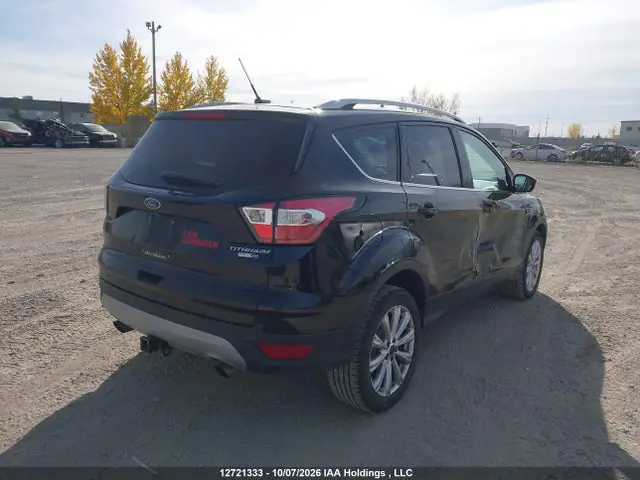 2017 Ford Escape Titanium VIN 1FMCU9J94HUD61105 фото 4