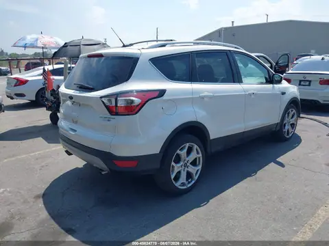 2017 Ford Escape Titanium VIN 1FMCU9J91HUC01411 фото 4