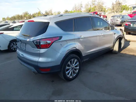 2017 Ford Escape Titanium VIN 1FMCU0J97HUA94974 фото 4