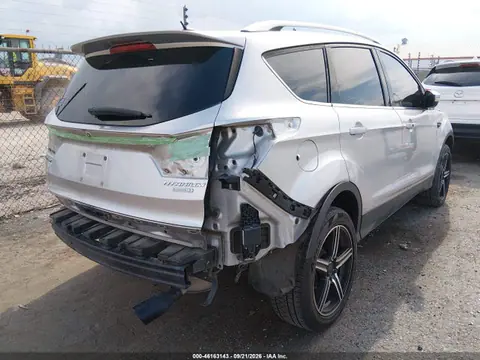 2017 Ford Escape Titanium VIN 1FMCU0J99HUC28724 фото 4