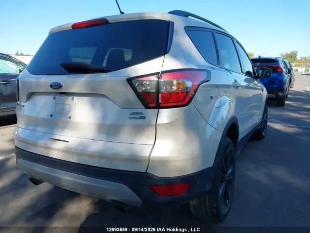 2018 Ford Escape VIN 1FMCU9HD6JUA00748 фото 4