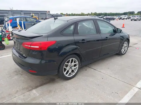 2015 Ford FOCUS SE VIN 1FADP3F24FL319938 фото 4