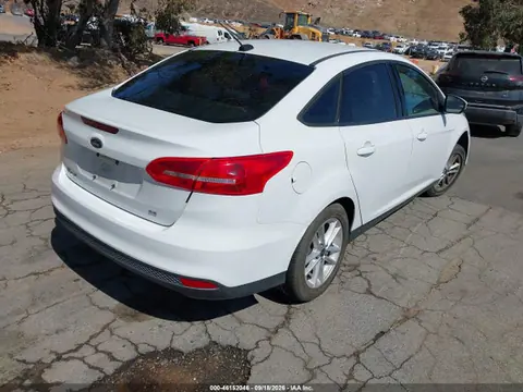 2015 Ford FOCUS SE VIN 1FADP3F23FL336309 фото 4