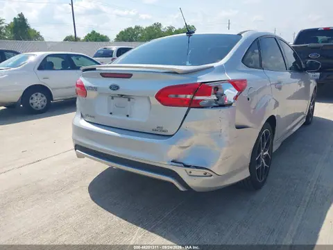 2015 Ford FOCUS SE VIN 1FADP3F27FL248167 фото 4