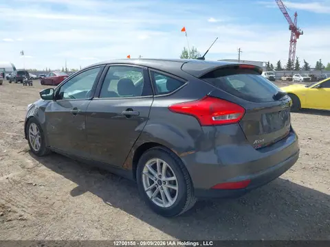 2016 Ford FOCUS SE VIN 1FADP3K2XGL214814 фото 3
