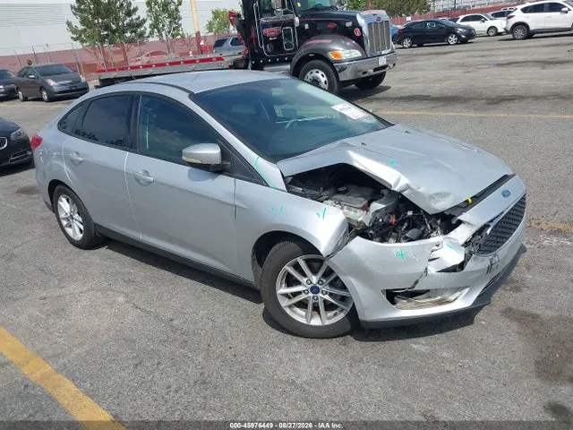 2016 Ford FOCUS SE VIN 1FADP3F20GL271288 фото 1