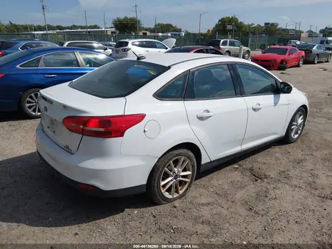 2016 Ford FOCUS SE VIN 1FADP3F24GL373144 фото 4