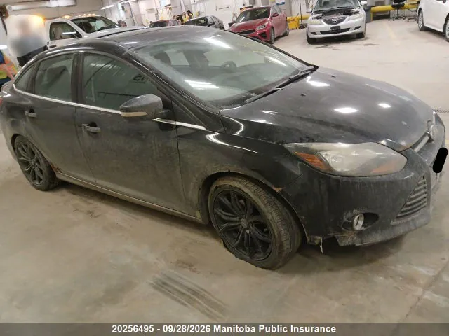 2014 Ford Focus Titanium VIN 1FADP3J23EL331570 фото 1