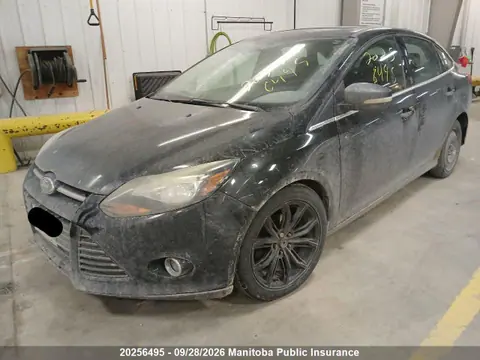 2014 Ford Focus Titanium VIN 1FADP3J23EL331570 фото 2