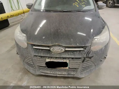 2014 Ford Focus Titanium VIN 1FADP3J23EL331570 фото 3