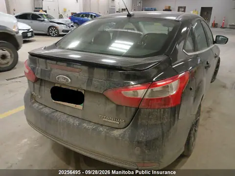 2014 Ford Focus Titanium VIN 1FADP3J23EL331570 фото 4