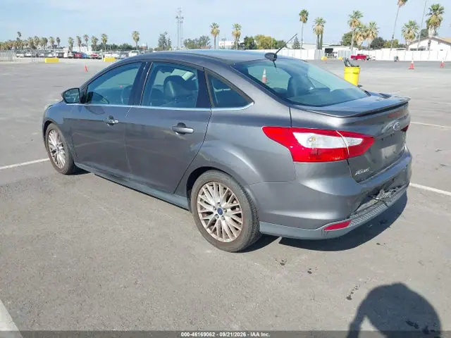 2014 Ford Focus Titanium VIN 1FADP3J20EL382573 фото 3