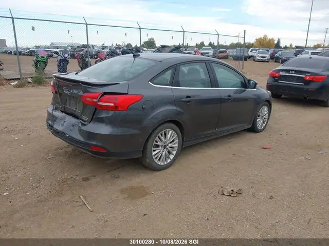 1FADP3J21FL211767 — 2015 Ford Focus Titanium, фото 4 с аукциона IAAI 14.10.2026, Задняя часть