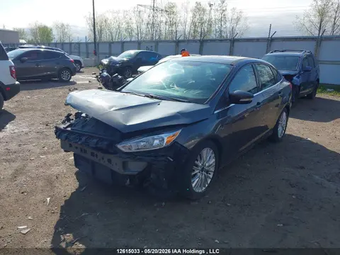 2016 Ford Focus Titanium VIN 1FADP3J24GL341690 фото 2