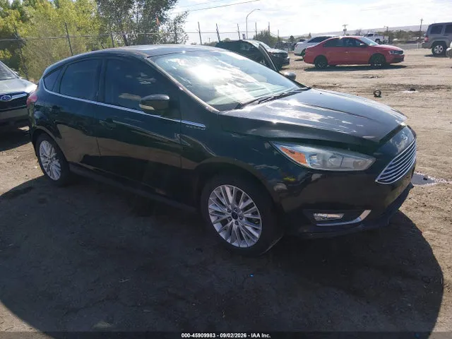 2016 Ford Focus Titanium VIN 1FADP3N22GL394964 фото 1
