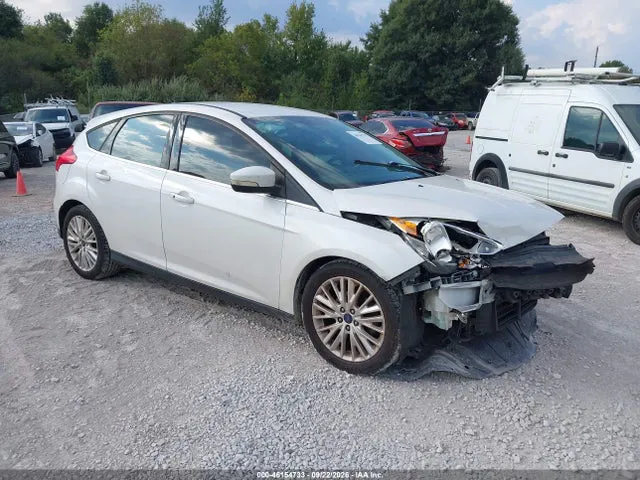 2016 Ford Focus Titanium VIN 1FADP3N23GL307945 фото 1