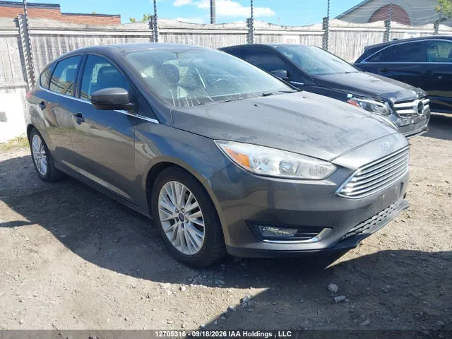 2018 Ford Focus Titanium VIN 1FADP3N27JL296259 фото 1