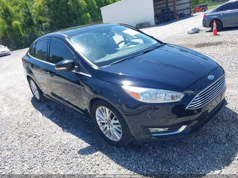 2018 Ford Focus Titanium VIN 1FADP3J27JL202015 фото 1
