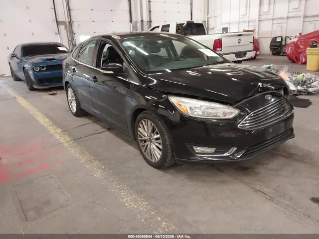 2018 Ford Focus Titanium VIN 1FADP3J27JL314992 фото 1