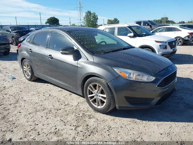2016 Ford Focus VIN 1FADP3F23GL323139 фото 1