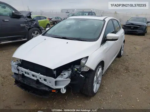 2016 Ford Focus Titanium VIN 1FADP3N21GL370235 фото 3