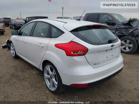2016 Ford Focus Titanium VIN 1FADP3N21GL370235 фото 4