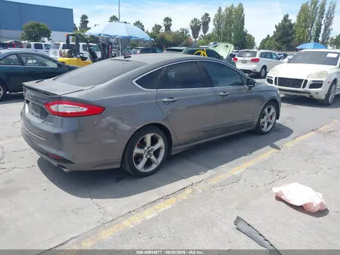 2014 Ford Fusion Energi Titanium VIN 3FA6P0SU6ER111610 фото 4