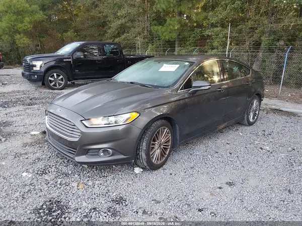 3FA6P0HD5GR103928 — 2016 Ford Fusion, фото 2 с аукциона IAAI 13.10.2026, Задняя часть
