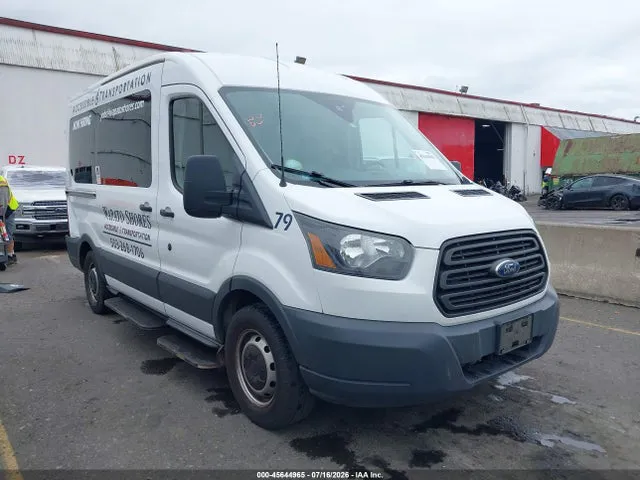 2018 Ford Transit-150 VIN 1FTYE1CM8JKA86673 фото 1