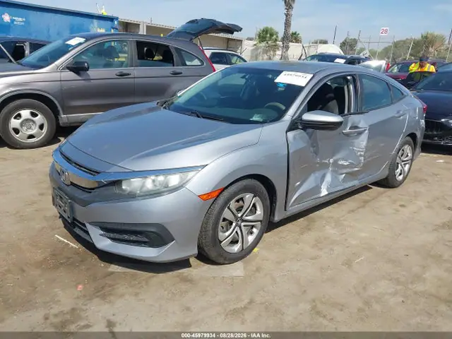 2HGFC2F52HH566461 — 2017 Honda Civic LX, фото 2 с аукциона IAAI 30.09.2026, Левый бок