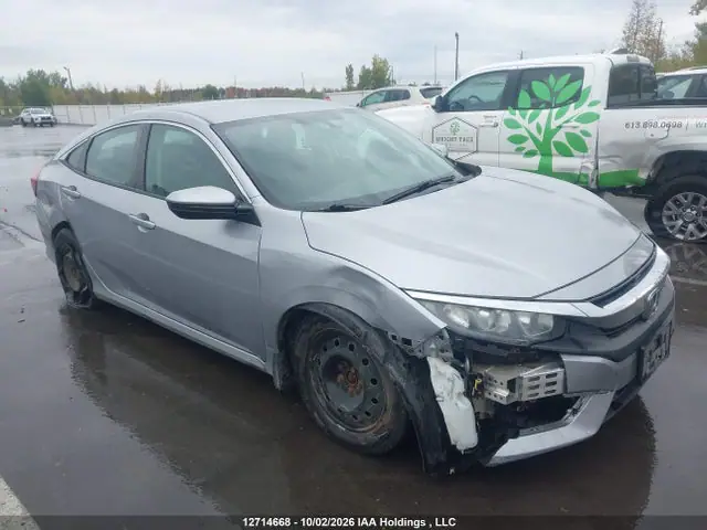 2HGFC2F51JH019462 — 2018 Honda Civic LX, Передняя часть (Front), фото до ремонта