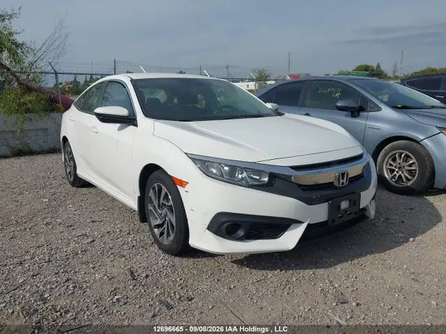 2HGFC2F65JH031199 Honda Civic SE 2018 — повреждение Подтопление, фото до ремонта
