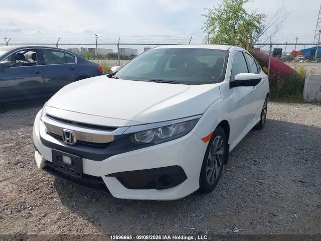 2HGFC2F65JH031199 — 2018 Honda Civic SE, фото 2 с аукциона IAAI 14.10.2026, Подтопление