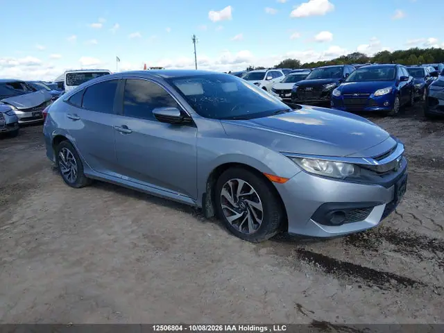 2HGFC2F64JH036331 Honda Civic Sedan 2018 — повреждение Угон, фото до ремонта