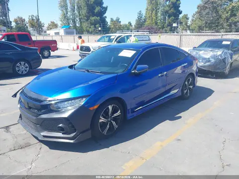 2016 Honda Civic Touring VIN 19XFC1F93GE021004 фото 2